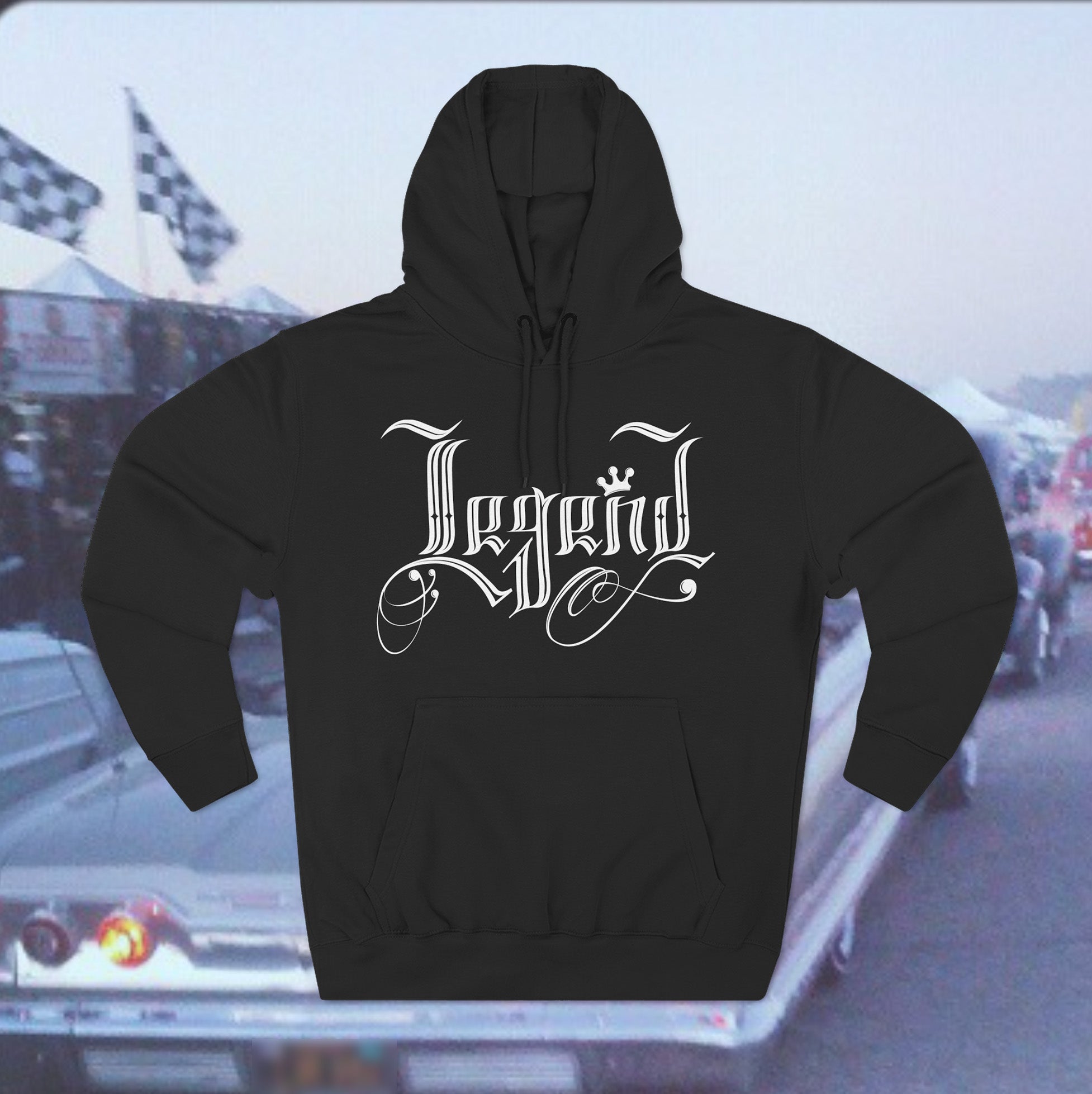Black hoodie with white text on a blurred background